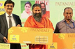 Baba Ramdevs Patanjali launches Swadeshi SIM cards in partnership with BSNL